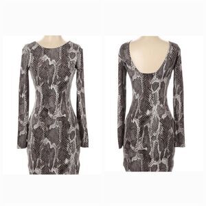 "Jennifer Lopez" body cone dress size M